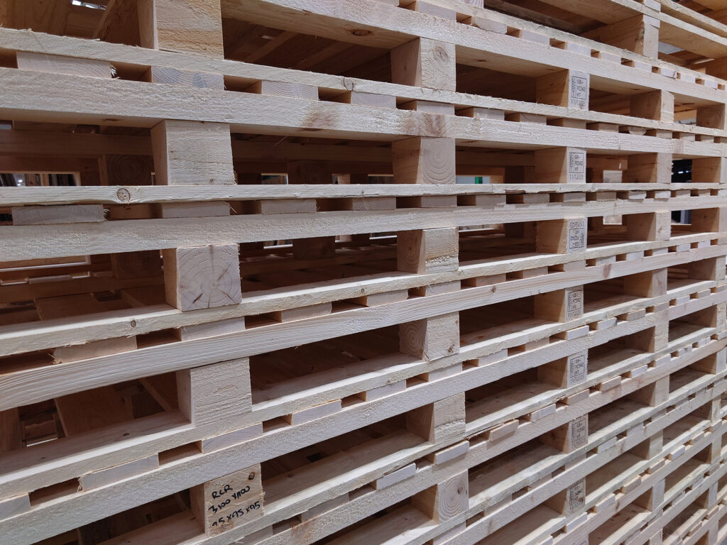 Large bespoke pallets stacked at APS Packaging